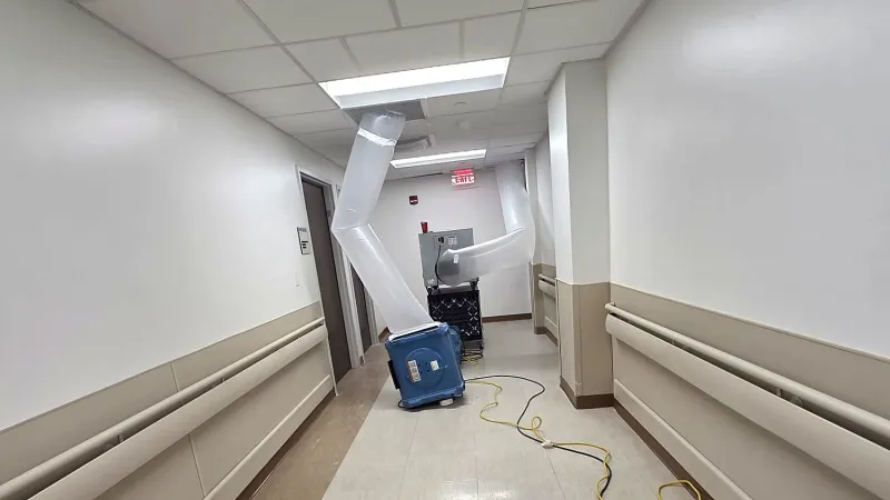 Commercial corridor renovation with ducted equipment running