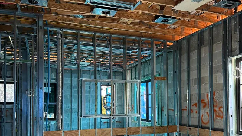 Steel stud framing and rough in during a commercial buildout