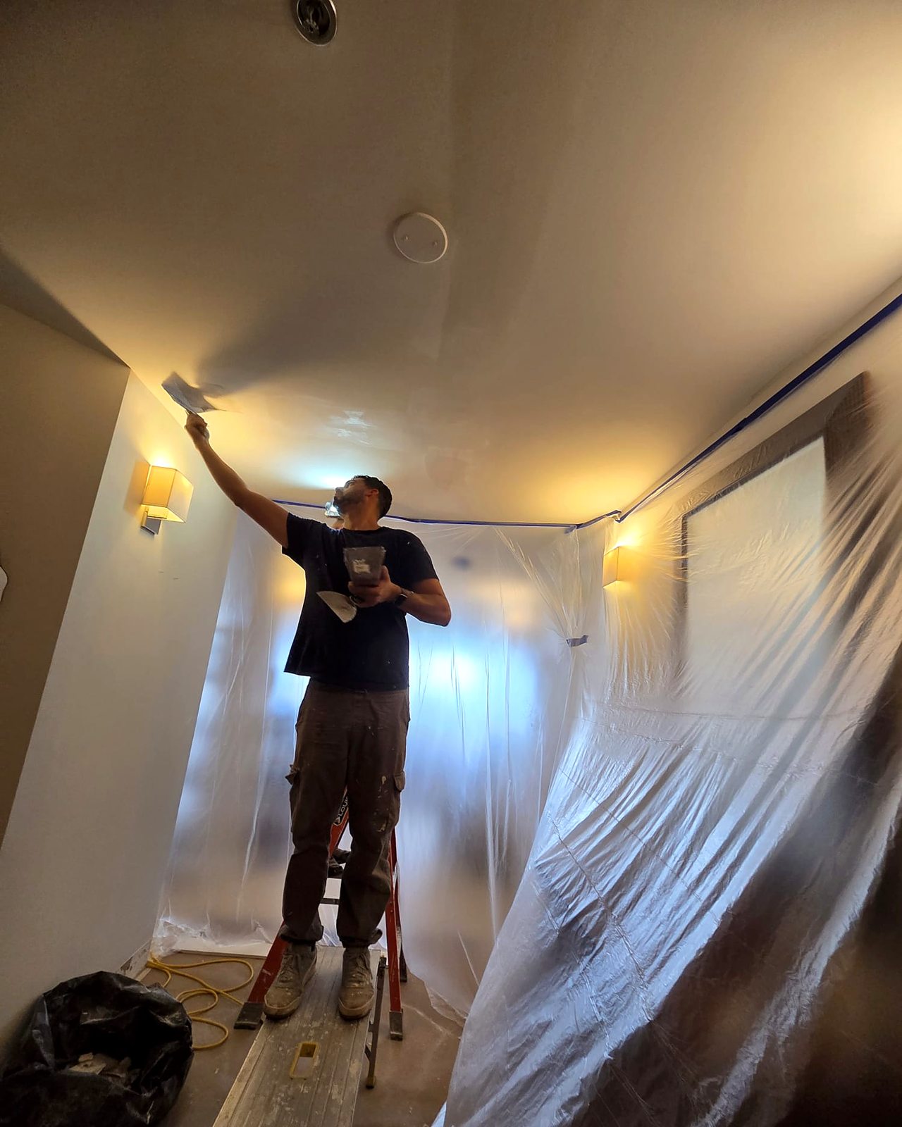Ceiling plastering crew at work, Miami